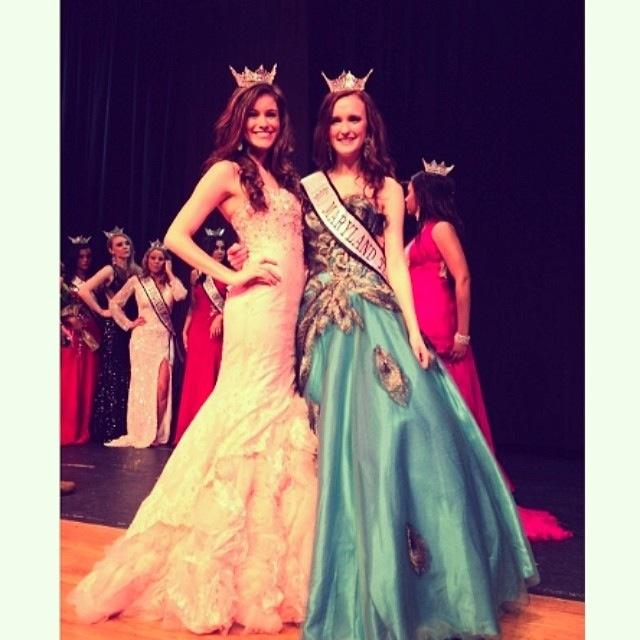 SOPHOMORE KAT SPILLANE smiles next to Olivia Diventi, last year’s pageant winner, shortly after winning the Maryland division of the 2014 Princess America pageant Feb. 22.