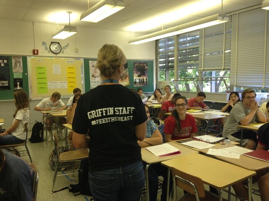English teacher and journalism advisor Maria Hiaasen works with period 3A Griffin staff about what it really means to #feedthebeast Aug. 29.