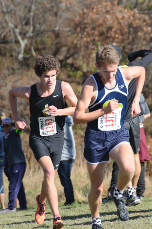 Junior Eric Walz runs in the mens cross country championship Nov. 8. The team finished second overall.