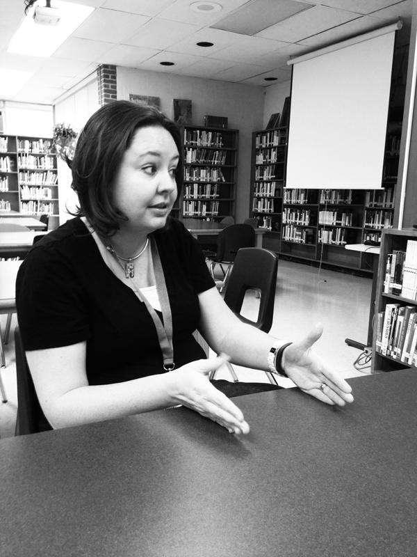 LIBRARIAN ANGELA SOFINOWSKI talks Nov. 5 about adjusting to the environment here and about the changes
she is implementing to the library. “I think a big challenge is to get the students to see who I am,” she said.