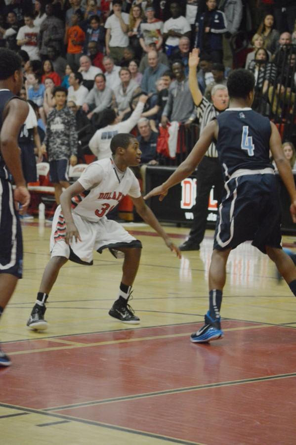Junior guard Javon Smith reacts to a play during the fourth quarter. 