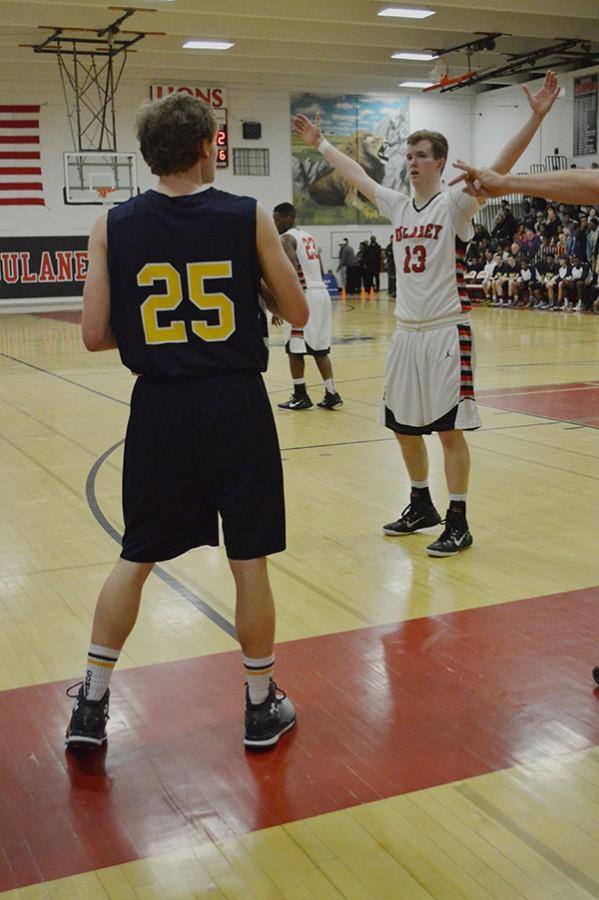 Junior guard Joey ODweyer attempts to block a Catonsville pass in the fourth quarter.