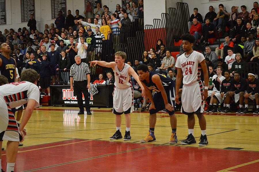 Senior guard James Bonner communicates with teammates during a Catonsville free throw during the third quarter.