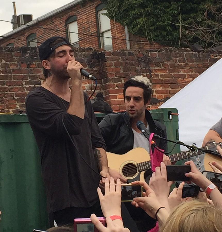 Alex Gaskarth and Jack Barakat of All Time Low perform Weightless in The Sound Garden parking lot April 3.