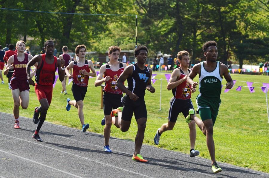Juniors Eric Walz, Sean Smyth and senior Adolfo Carvahlo race among participants in the varsity boys 800m finals on May 8. All three placed in the top 10, with Smyth in 4th, Walz in 6th and Carvahlo in 7th.