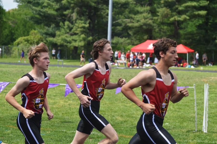 Freshman Matt Owens, sophomore Drew Persinger and freshman Jacob Plasse run during the junior varsity boys 3200m finals. Owens, Persinger and Plasse placed 2nd, 9th and 5th, respectively.
