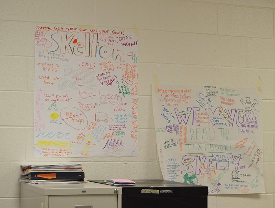 Skelton hangs posters made by students in her AP World and AP US History classes, which she plans to bring home with her. 