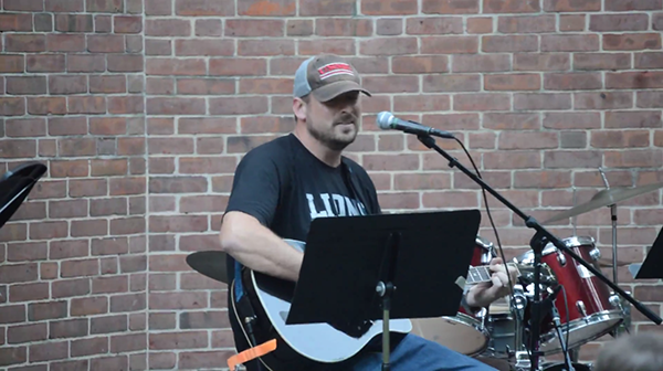 Principal Sam Wynkoop performs “Hearts and Thoughts” at the Sept. 17 Open Mic Night Concert.