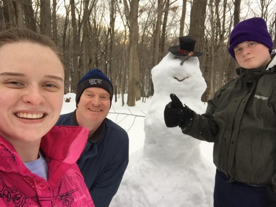 Projects manager Hannah Bauer built a snowman she dubbed Conrad with her father and brother Jan. 26.