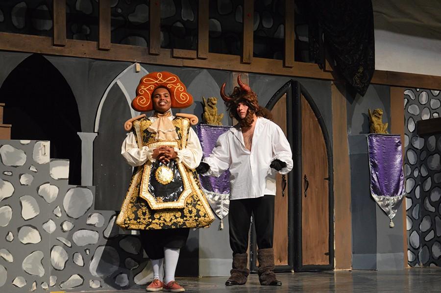 Senior Bryan Kihara  rehearses a scene of Beauty and the Beast with senior Henrique Carvalho March 9. Carvalho was among the nominees for Best Lead Actor in a Musical.