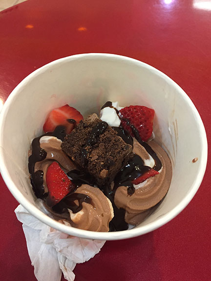 Chocolate and vanilla frozen yogurt, complete with strawberries, brownies and fudge, from Tutti Frutti. 