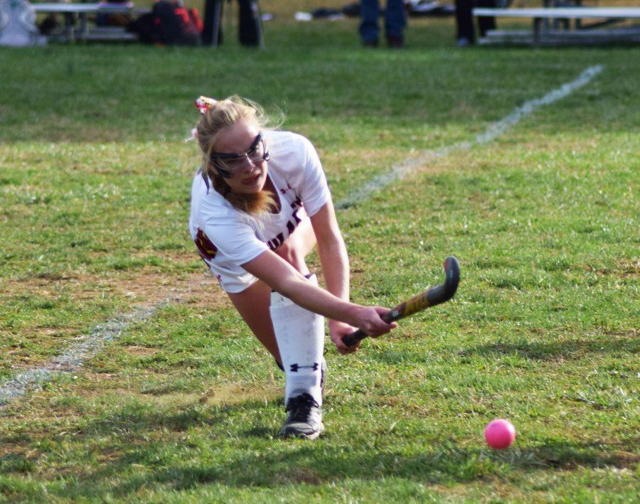 Senior midfielder Claire Podles passes the ball in the MPSSAA  regional semifinal Oct. 31. Podles scored one of the teams three goals in the 3-1 win over Catonsville. 