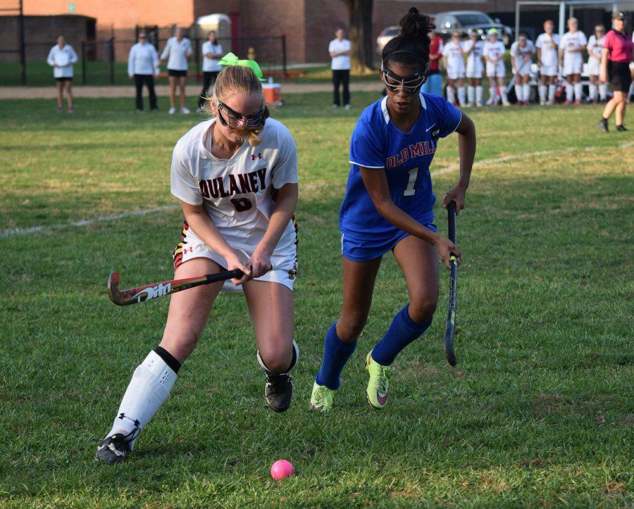 Senior midfielder Claire Podles eludes a defender from Owings Mills.
