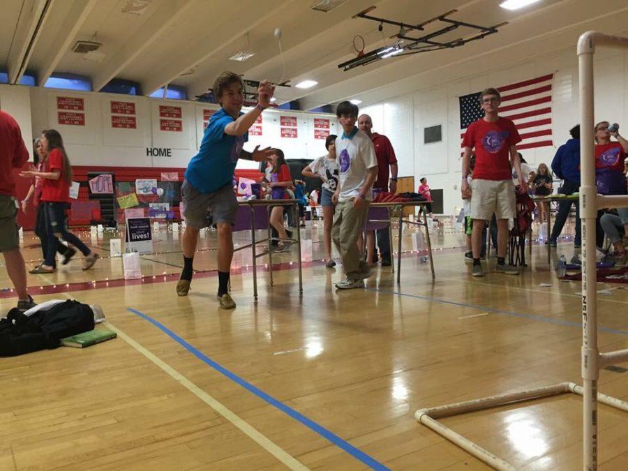Students play a horseshoe-like game in the gym during last year’s Relay for Life April 16. As a fundraiser, groups brought their own games and charged for tickets to play. 