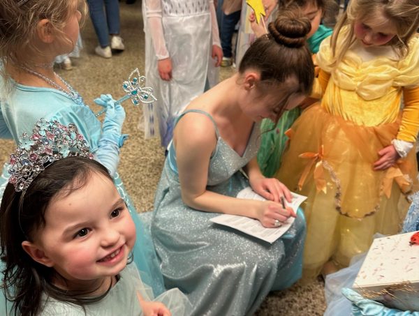 Laura Neer, as Cinderella, meets with other princesses attending the Saturday matinee performance.