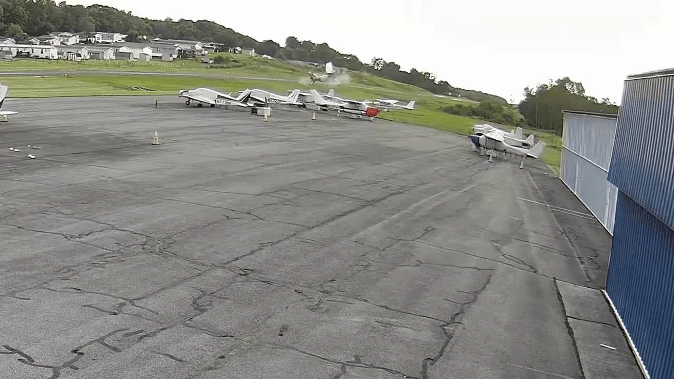 Surveillance Video Shows Fatal Carlisle Airport Collision as Small Plane Strikes Pennsylvania State Police Helicopter, Killing the Cessna Pilot and Injuring Two Troopers