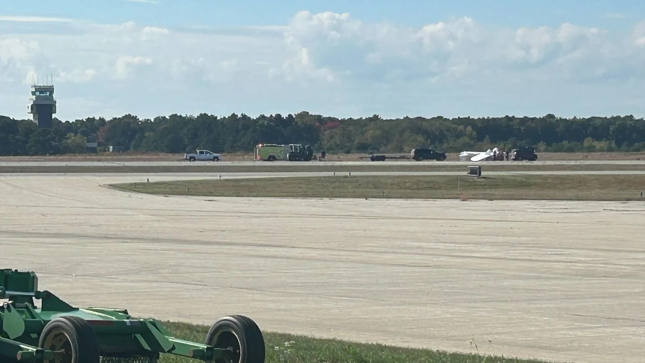 82-Year-Old Pilot Suffers Minor Injuries After 1939 Kinner Sport-Wing Flips on Landing at Brunswick Executive Airport During Maine Stopover
